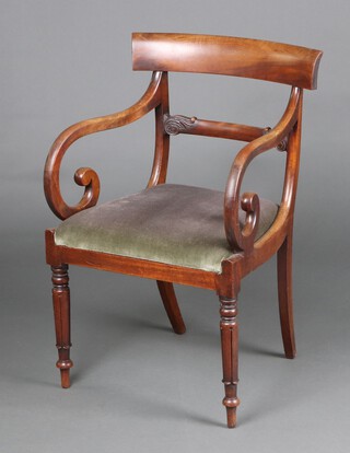 A Georgian mahogany bar back carver chair with shaped mid rail and upholstered drop in seat, raised on turned supports 86cm h x 55cm w x 45cm d (seat 29cm x 30cm) 