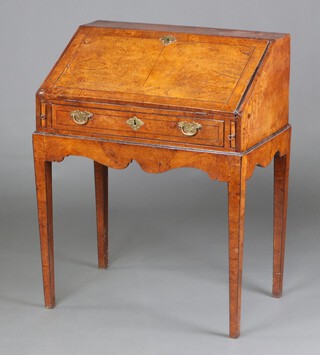 A Queen Anne style crossbanded walnut bureau on stand, fitted pigeon holes and drawers, the base fitted a drawer, raised on square tapered supports 97cm h x 76cm w x 48cm d 
