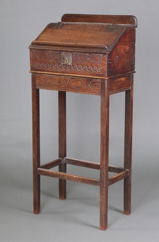 A 17th/18th century carved oak bible box with raised back and raised on a craved oak associated base 126cm h x 58cm w x 34cm d