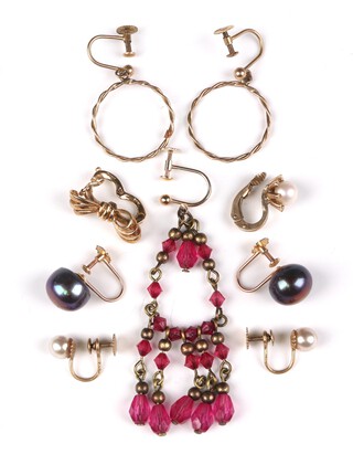 A pair of cultured black pearl 9ct gold earrings, 2 other pairs, 2 singles and a 9ct clip 