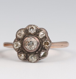 A 9ct 8 (ex 9 stone) diamond ring size J, 1.2 grams