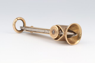 A 9ct yellow gold cheroot cutter, gross weight 11 grams 