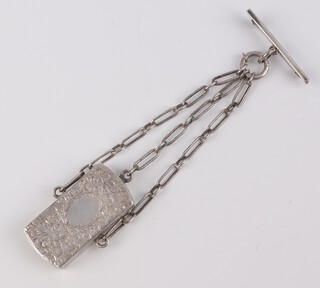 A Victorian silver vesta with engraved scroll and floral decoration and vacant cartouche, rubbed date letter 4.5cm, on a silver Albert, maker Sampson Morden and Co., 30 grams