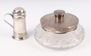 A Georgian style silver muffineer pepper  with S scroll handle 7.5cm, London 1990, 36 grams, together with a silver mounted glass powder bowl Birmingham 1937