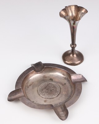 A circular silver coin set ashtray Birmingham 1900, a tapered posy vase London 1908, gross weight 178 grams 