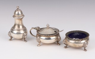 A silver 3 piece condiment comprising mustard, salt and pepper London 1936 and 1940, 37 grams 