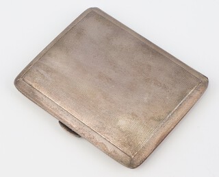 An Art Deco silver engine turned cigarette case Birmingham 1936, 8cm x 7cm, 82 grams 