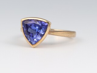 A 9ct yellow gold triangular cut tanzanite ring, approx. 3ct, size O, 5.4 grams 