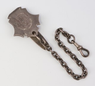 A Victorian cast silver belt clip with silver Albert and engraved monogram, London 1884, 40 grams 