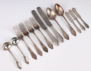 A small quantity of Art Deco sterling silver cutlery comprising 4 dinner forks, 2 dessert spoons, 3 butter knives, 2 silver handled knives, 2 ladles weighable silver 392 grams 