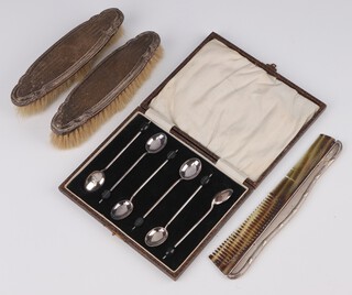 A set of 6 silver bean end coffee spoons Birmingham 1922 and 2 silver backed hair brushes, gross weight 62 grams 