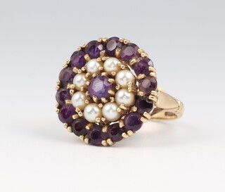 A 9ct yellow gold amethyst and seed pearl cluster ring, size M 1/2, 5.3 grams
