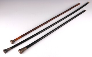 An Edwardian ebonised walking cane with silver knop, 2 others, rubbed marks