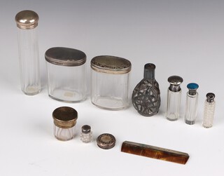 A silver mounted Chinese style oil bottle decorated with bamboo 10cm, a guilloche enamelled mounted scent (a/f), 3 others, a lid, comb and 4 mounted jars, weighable silver 78 grams 
