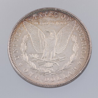 A Silver Morgan dollar 1885