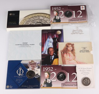 Five 2012 Diamond Jubilee commemorative crowns, 2007 and 2012 commemorative crowns, a Queen Elizabeth Queen Mother 90th crown, 1997 Golden Wedding crown, a 1973 commemorative crown and envelope, a 1990 ditto and a two pound coin 