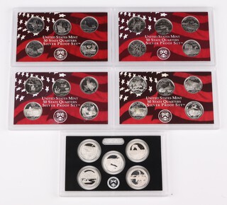 Five silver United States Mint quarters proof sets - 2001, 2003, 2004, 2006 and 2014, cased 