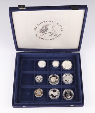 Five silver five pound coins 1998, 2004, 2005(x2) 2007, a Barbados Dollar 1994, an Alderney one pound and ditto two pound 2003 and a one pound 2003, 181 grams 