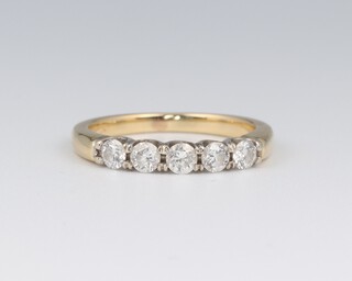 A 14ct yellow gold 5 stone diamond ring 0.35ct size J, 2.7 grams 