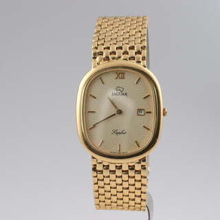 A gentleman's 18ct yellow gold quartz wristwatch, the dial inscribed Jaguar with the Jaguar motif and Saphir, the case numbered J581/8078, with spare links, gross weight including movement and glass 83.6 grams, with original box, outer box, international guarantee and world service booklets