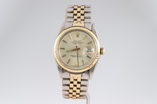 A gentleman's Rolex Oyster Perpetual datejust in a bi-metallic 35mm case on a bi-metallic strap, with presentation inscription, the bracelet numbered 6251/H, the watch was purchased in 1969 and is complete with receipt numbered 1933984, receipt folder, box, outer box, tag, pochette, polishing cloth, booklet, guarantee booklet and International service guarantee card 