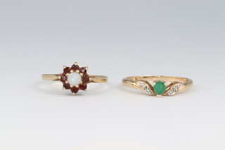 A 14ct yellow gold emerald and diamond ring, the emerald approx. 0.3ct, the 4 diamonds 0.01ct, size K, 1.4 grams and a 9ct opal and garnet ditto size L 1.1 grams 