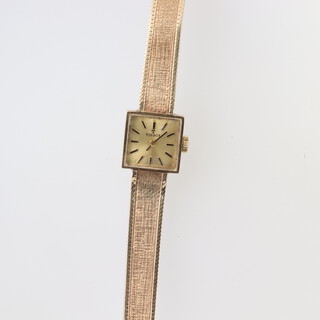 A lady's 9ct yellow gold square cased Tissot wristwatch on a ditto mesh bracelet, 13 grams including the glass 