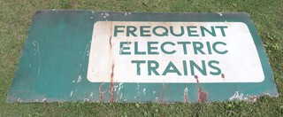 Of railway interest, a Southern Railway green and white enamelled sign "Frequent Electric Trains" 194cm x 181cm 