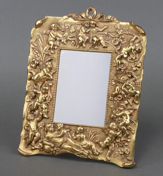 A 19th Century cast gilt metal easel photograph/mirror frame cast cherubs and figures 30cm x 23cm 