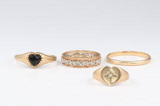 Four 9ct yellow gold gem set rings, sizes E, J, L 1/2 and Q 1/2, 6 grams 