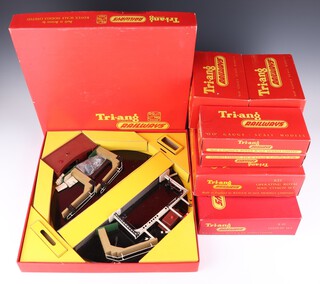 A Triang OO gauge R45 turntable set, an R81 station set, R23 operating Royal Mail coach set, R76 engine shed (x2) and R71 foot bridge (x2) boxed 