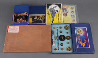 A Meccano Gear Outfit A boxed and with instructions, a Meccano No.3A Outfit in original wrapping, ditto No.1 Clockwork Motor in running order and complete with key and an E20R electric motor boxed 