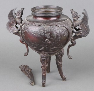 A 19th Century Japanese twin handled urn, the body cast mythical figures and with dragon twin handles, raised on outswept supports 33cm h x 37cm diam. 