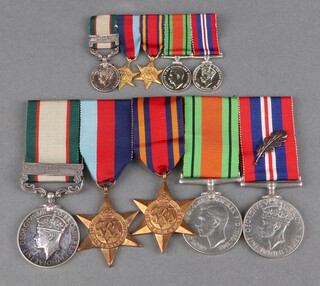A group of 5 medals to Major J.W. Kaye Royal Artillery comprising India General Service medal 1936-1939 Royal Mint Issue one bar North West Frontier, 1939-45 Star, Burma Star, Defence and British War medal with mention in dispatch mounted for wear, together with a set of miniatures  