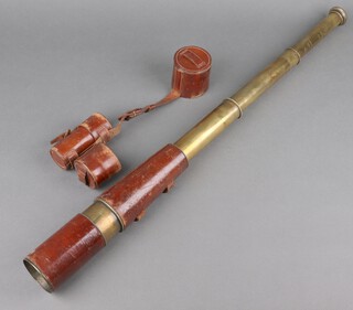 A Negretti and Zambra military issue 4 draw brass and leather mounted telescope with broad arrow marked TEL SIG (Mark IV) G.S Negretti and Zambra London no.15521 together with spare high lens 