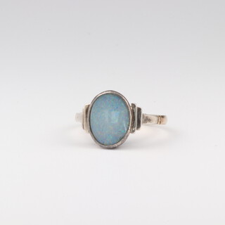A 9ct and silver opal ring, size L 1/2, 2.3 grams 