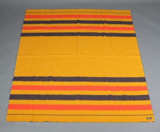 Hermes, a tan, orange and black striped blanket, labelled Hermes, 182cm x 148cm
