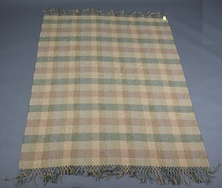 Hermes, a green and yellow patchwork style wool blanket with deep fringe, labelled Hermes, 187cm x 145cm 