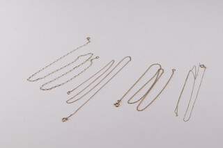 Four 9ct yellow gold necklaces 44cm, 45cm, 45cm and 46cm, 4 grams 
