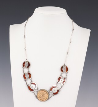 A silver and enamel 7 plaque necklace, the centre containing a sovereign 1958 47cm 
