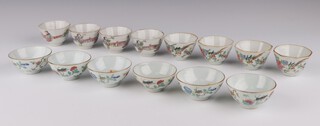 Three set of famille rose cups, late Qing dynasty, comprising a set of four octagonal cups painted with ladies in a fenced garden, a set of four octagonal cups, painted with birds perched on branches of peony and a set of six cups, painted with a grasshopper and praying mantis amongst peony 3cm h x 7cm diam (14)
