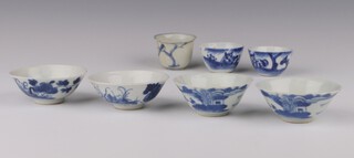 A blue and white cup, late Ming dynasty 3.5 cm and three pairs of blue and white cups, Qing dynasty, the cup painted with a bird on a tree branch, one pair of cups painted with a horse in Kangxi style 3cm , another pair painted with peony 2.5cm and another with a retreat in a river landscape 3cm (5)
