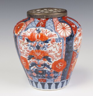 A 19th Century Imari oviform vase decorated with panels of birds and flowers 20cm, with metal grill cover 