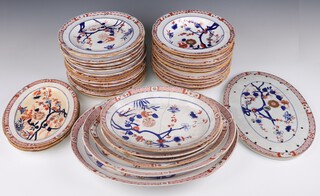 A 19th Century 40 piece Copeland and Garrett Imari pattern dinner service comprising 6 oval meat plates (1 riveted), 3 small meat plates, oval strainer, 13 soup bowls and 16 dinner plates (8 cracked) 