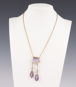 A 9ct yellow gold necklace set with 1 oval amethyst, 2 pear cut amethysts and 2 brilliant cut amethysts 36cm, 13.7 grams 