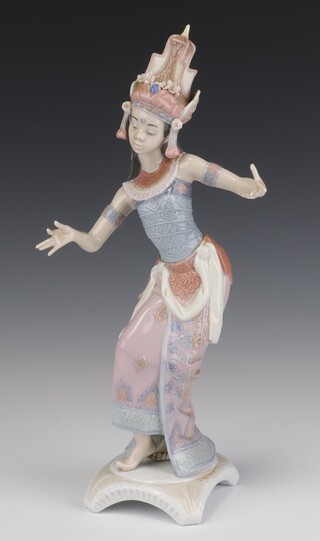 A Lladro figure "Indian Dancer" no. 6143 32cm and "Indian Pose" 6142 22cm 
