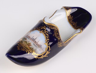 A Dresden porcelain slipper decorated with a Continental townscape 16cm 