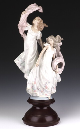 A Lladro figure "Allegory of Liberty" no. 5819, 53cm on a turned wooden socle 