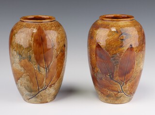 A pair of Royal Doulton brown glazed decorated with leaves X8581J8067 18cm 