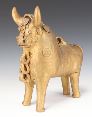 A Continental earthenware flask  in the form of a standing bull with gilt decoration 35cm 